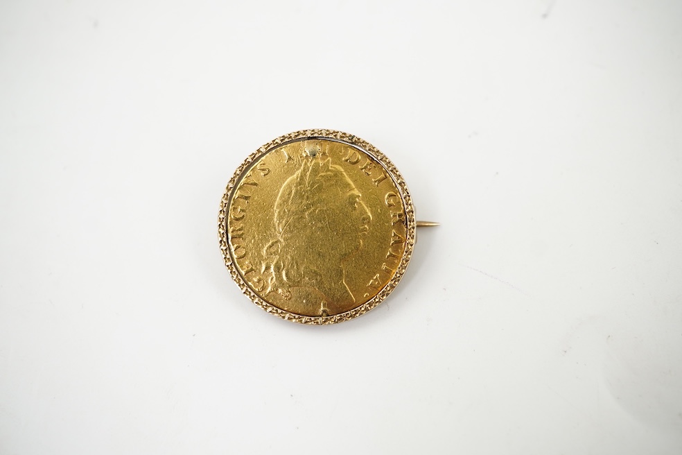British gold coins, George III, gold guinea, 1794, in a swivel mount, plug at 12 o’clock position, otherwise good